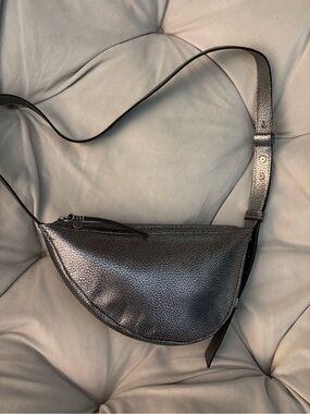The Sak metallic pewter mini crescent crossbody bag Tess sling
